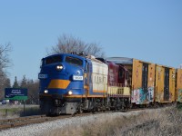 OSR 1400 leads the Cayuga Clipper heading for St. Thomas. Passing the Putnam sign, after making up their train in Ingersoll. This will be one of the last Cayuga Clippers to be seen.