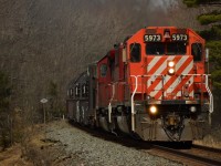 After meeting train 119 at Brignall, CWR-06 is sounding off for Lake Joeseph road on the home stretch about 5 miles from a quick crew change at MacTier, before carrying onto Toronto with rail for the Northeast US. 