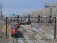 CN 120 is exiting Taschereau Yard with four GE's up front (CN 2902, CN 3805, CN 2985 & CN 3843).