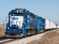 CN L580 slowly trundles through the 10mph slow order at Mile 22 of the Hagersville Subdivion on their way back to Brantford after working the CGC Plant in Hagersville and Nicholson and Cates Lumber in Caledonia.  Presently the CN mega gang is on the line replacing some 6000 ties to help remove some of the many speed restrictions on the line.  Photo taken at 16:00hrs...for those keeping track.