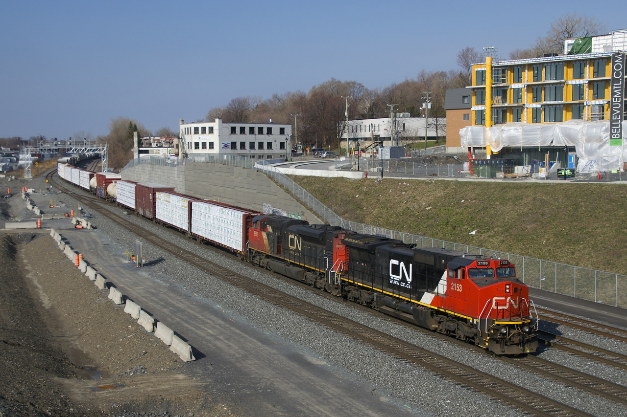 CN 324 with CN 2153, CN 8882 and 57 cars is on its way to St. Albans, Vermont and interchange with the New England Central Railroad.
