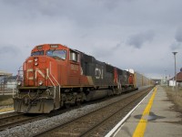 Autorack train CN 271 is passing through Dorval during a brief period of sunshine with EMD's CN 5685 & CN 5604 for power.