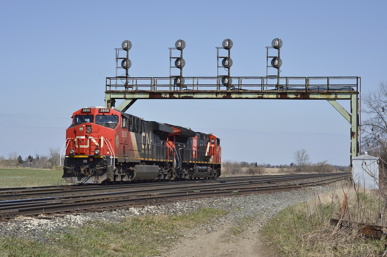 Where's your train? CN 3803 after leaving his train just south of the yard at Paris, backs into the Paris West siding to pick up a string of tank cars, as well as two coils in the mix. Mother nature threw me a sucker hole today before the wet weather tomorrow, a nice treat for Easter, even though its just two GE. Happy Easter everyone!