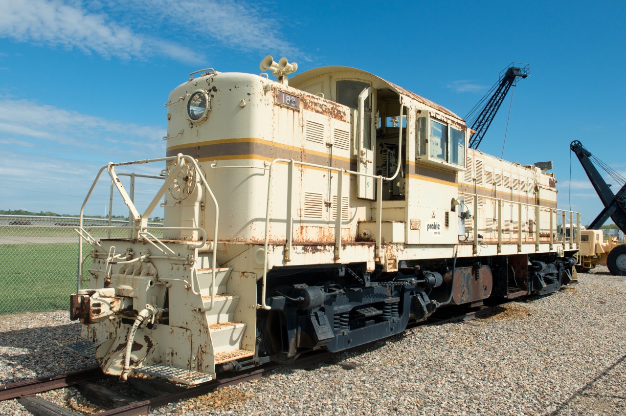 Prairie Coal Ltd Alco RS-1 #182 sits "preserved" just outside Estevan Saskatchewan. This unit started out as Great Northern 182 and was built 9/1944.
CP's Weyburn Subdivision can be seen in the background.