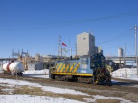 Ex-Port of Montreal SW1001 AXLX 7602 does some switching at the Axiall Canada Inc. plant.