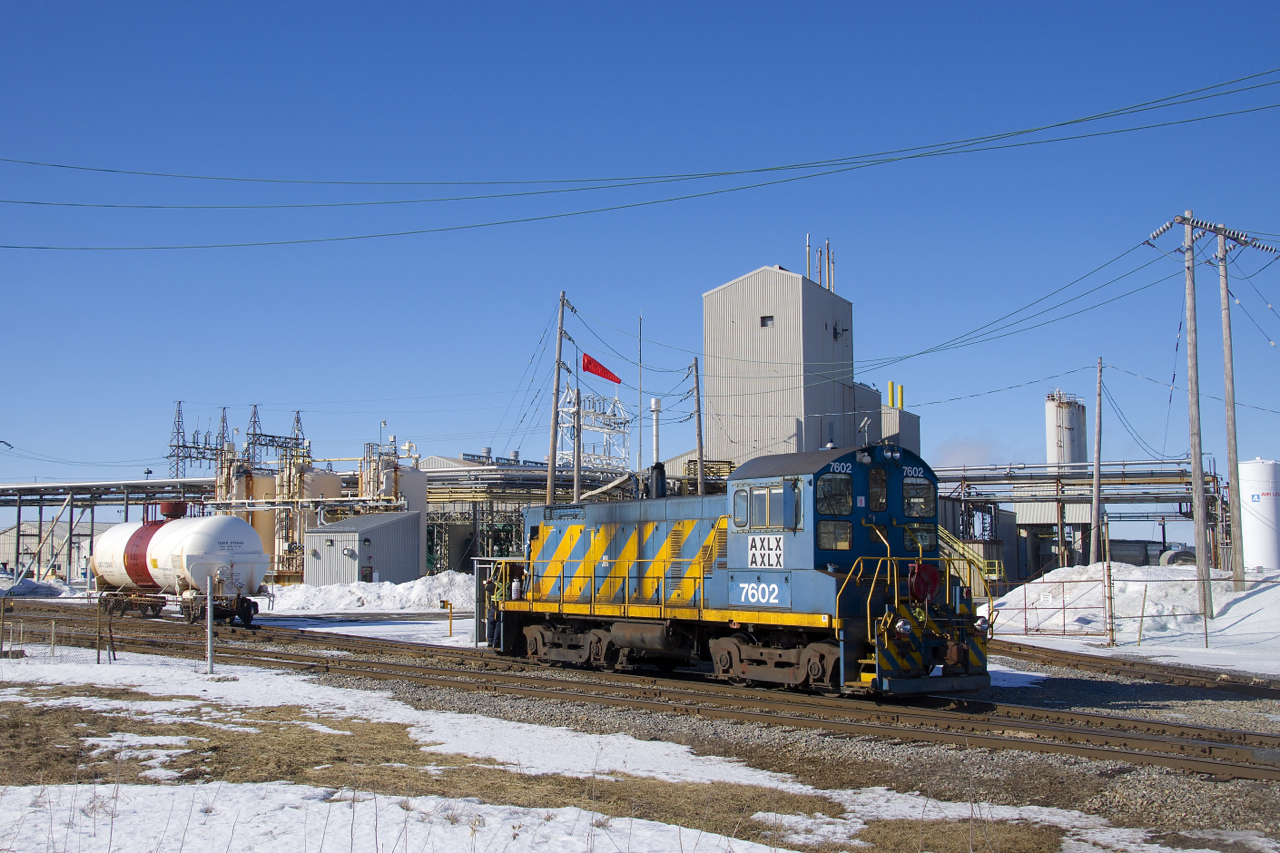Ex-Port of Montreal SW1001 AXLX 7602 does some switching at the Axiall Canada Inc. plant.