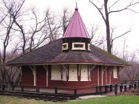 Interestingly, I was going through one of the group sites on Facebook, and up popped a memory post from the Toronto Historical Railway Association. It was of the time that the Don Station moved...again to it's now final resting place, nestled in the heart of downtown's former railway lands. I was glad to see the THRA's post, as I had forgotten about this photo I took now over 12 years ago. The weather wasn't the greatest, similar to what we are experiencing this week. It was one of those miserable, rainy days.
<br>
<br>
Back then, the station's future was still uncertain. I was informed through a close friend at the time, that the THRA was having discussion with the city to moving the station to downtown into what is now Roundhouse Park, from it's then current location of Todmorden Mills. There seemed to be some funding that needed to happen, in order to save the station. The bigger question was going to be how to move the structure, while preserving it's appearance. Unfortunately my notes have been misplaced, but the result has been quite clear, as the move was successful (approx. 2 years after). <a href="http://www.railpictures.ca/?attachment_id=24923">Please click here</a> to see the station, after it's move and still under restoration in April 2010.