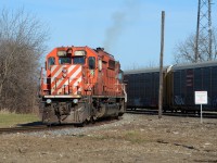 CP’s CWR Train throttles up light power as it rolls down the east end of the wye at Galt Yard to tie onto their train sitting in the Galt passing track just behind the auto racks. The pair of multimark SD40-2’s will later take the train back east to Toronto after waiting for the CP 4522 and 3083 to tag onto the rail train for transit to Toronto. The pair of aged 40’s would sit on the east end of the wye until 255 cleared East Siding Switch Orr’s Lake for them to get the light and head east. 