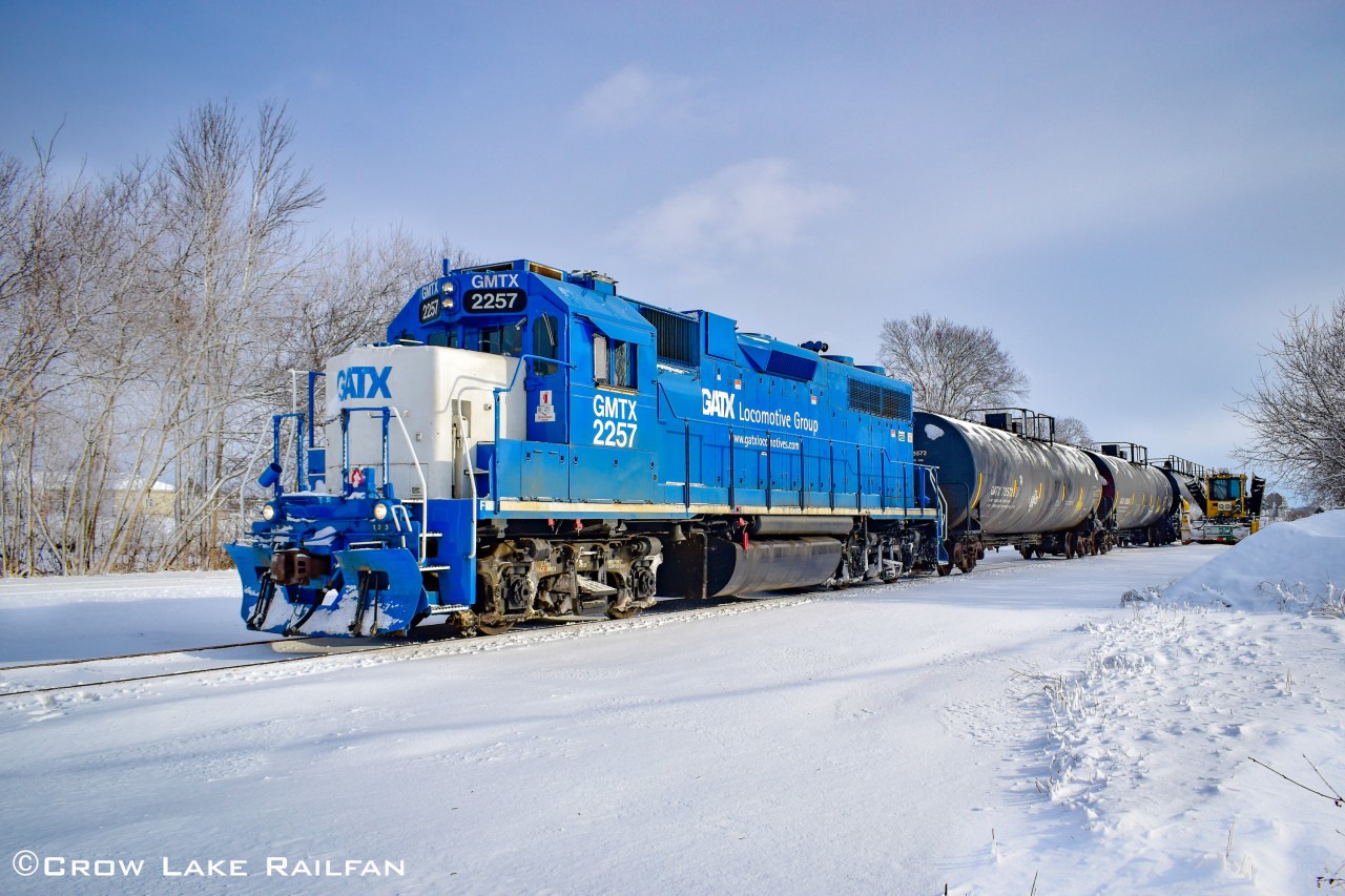 CN 589 slowly makes its way through Kinburn in December. CN 589 would start its day at the Walkley yard then head West, usually stopping at the Tim Hortons in Kanata for a short break and a coffee. After that it would continue through Kinburn and head to Arnprior and shunt the cars there then return to the Walkley yard.