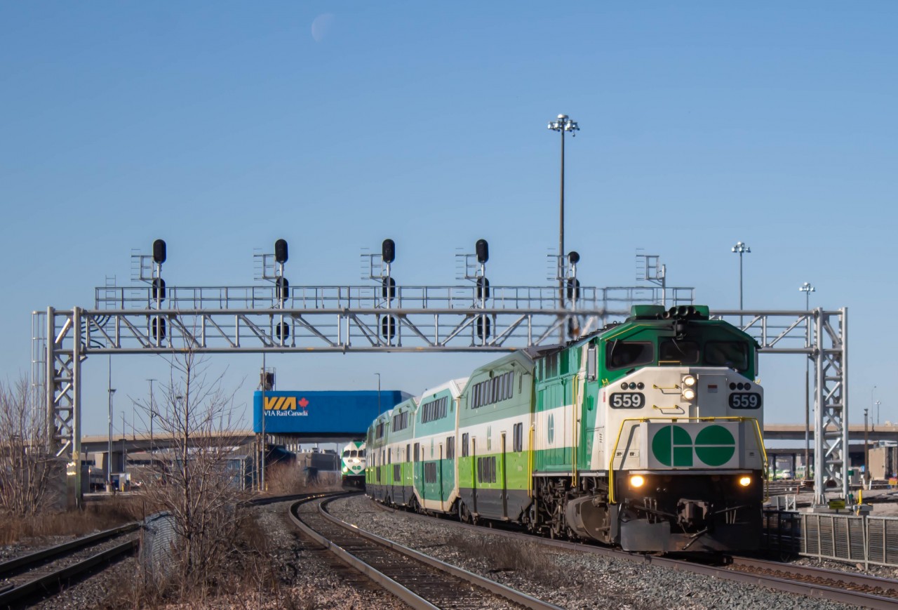This is a shot I took back around mid March at Mimico GO Station. Mimico GO is located at Mile 6.7 of  the CN Oakville Subdivision. This is a interesting spot due to the fact that there are two train yards. On the North side you have GO's Willowbrook Facility and on the South Side you Have TMC (Toronto Maintenance Center) Owned by VIA Rail. When I found out that the Express Niagara Falls Train was being lead by an F59 I immediately sprung out of bed and got trackside. Hope you enjoy, Stay Safe!