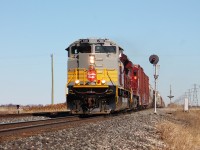 CP has been very generous to those of us living west of Toronto lately. 235 heads towards Windsor and ultimately Detroit with heritage ACU 7018 leading after it trailed vets unit 7021 on the same train earlier in the week. 