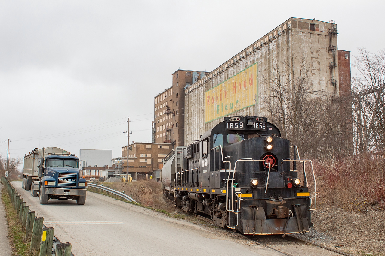 Trillium is pictured here at old Robin Hood mill, spotting flour hoppers for transloading. I was a little confused when first I came across a similar scene several months ago, seeing flour go directly from hopper to truck at the site of this old mill, and kind of wondered what the full story was. However, no sooner than a few days after taking this shot, my question was answered on the ol' Facebook: flour is shipped to here by rail from Ardent Mills in Minnesota, and transloaded directly to truck to be taken to Rich Products in Fort Erie. With respect to the mill itself, London Agricultural Commodities leases spaces from Ceres, and is using it for grain storage. They use rail service as well, and it was my understanding this unit grain train I saw in Vinemount in 2019 was ultimately destined for them.