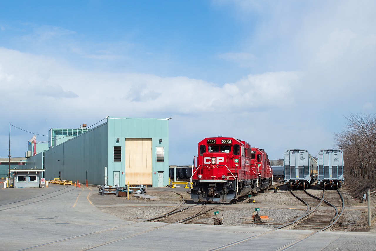 Things were pretty quiet at National Steel Car when I passed by last week - no surprise given the plant is now temporarily shutdown as physical distancing measures continue around the world. I happened across CP's weekday job - TH11 - pulling some of the new American Iron and Metal (AIMX) gons that had recently been painted. The other cars pictured are Shell plastic pellet hoppers, letter SPMX, which have been going out on CN. The tracks at NSC sit completely empty now, a sight I have not seen in some time given how busy they have been in recent memory. In addition to the cars pictured, other cars rolling off the line lately include new well cars, G3 grain hoppers, and potash hoppers. I would expect builds on all of these orders to resume once workers return. The G3 hoppers looked much like the standard CN, CP and GrainsConnect hoppers of recent, so don't get too excited.