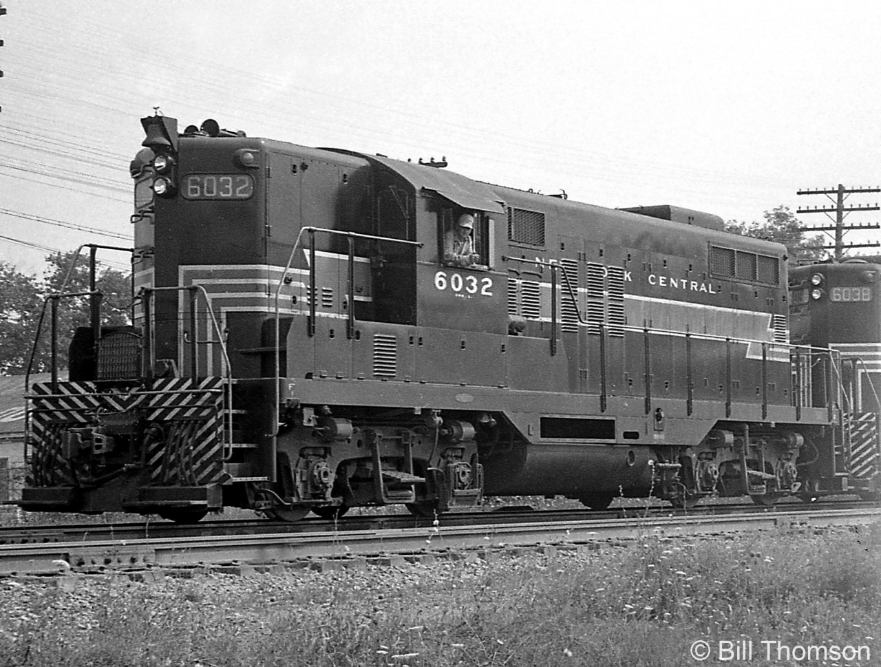 New York Central GP9 6032 is shown on CN's Oakville Sub at Port Credit, likely working on the CP/TH&B Toronto-Hamilton "Starlight" that had trackage rights over CN from Canpa to Hamilton West. Note the Automatic Train Control (ATC) "shoe" on the second axle for operation over Welland to Buffalo trackage.

NYC 6032 was one of the Canadian-built GMD units assigned to NYC's Canada Southern (CASO) operations, and would continue operating over the same territory under successors Penn Central and Conrail as their 7432. It was retired and sold to the Ashland Railway (ASRY), and became their 32.