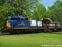 One for the Hamilton and TH&B fans - here we have Cndr. Lance Brown in the cab of RLK 4001 as they have a special, unusual move out of Dofasco's Bayfront facility, a damaged Dofasco locomotive. With the locomotive going to Hamilton's own Railcare for repairs, it did not go far, but I was pleased to be there to capture the moment on camera. Dofasco literally ships nothing by rail directly out of their Hamilton facilities, except the odd Locomotive or bottle car going for repair (every 10 years or so). However, I do believe Dofasco uses the services of the local CN and CP Steel Transfer facilities. The diamond in the foreground allows the bayfront lead to cross the former Coke Oven lead used for NSC storage cars, and Dofasco's plant is well hidden behind all that greenery unfortunately. More to come