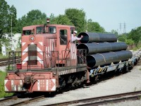 Nice to see a friendly wave from a Stelpipe (Welland Tube) employee as he brings old Stelpipe #7 out from behind the gates at the plant on Rusholme Rd in Welland.  The pipe will eventually end up being transferred over to the CN Southern Yard to be picked up by either CN or CP.
Hard to catch a move here. Most of the time the switcher is shut down or inside the plant. Currently in this location is Martech, Inc.  The Stelpipe operation is long gone, but I haven't information as to what year they left.