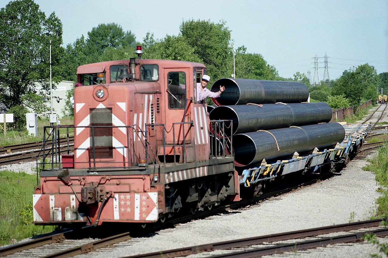 Nice to see a friendly wave from a Stelpipe (Welland Tube) employee as he brings old Stelpipe #7 out from behind the gates at the plant on Rusholme Rd in Welland.  The pipe will eventually end up being transferred over to the CN Southern Yard to be picked up by either CN or CP.
Hard to catch a move here. Most of the time the switcher is shut down or inside the plant. Currently in this location is Martech, Inc.  The Stelpipe operation is long gone, but I haven't information as to what year they left.
