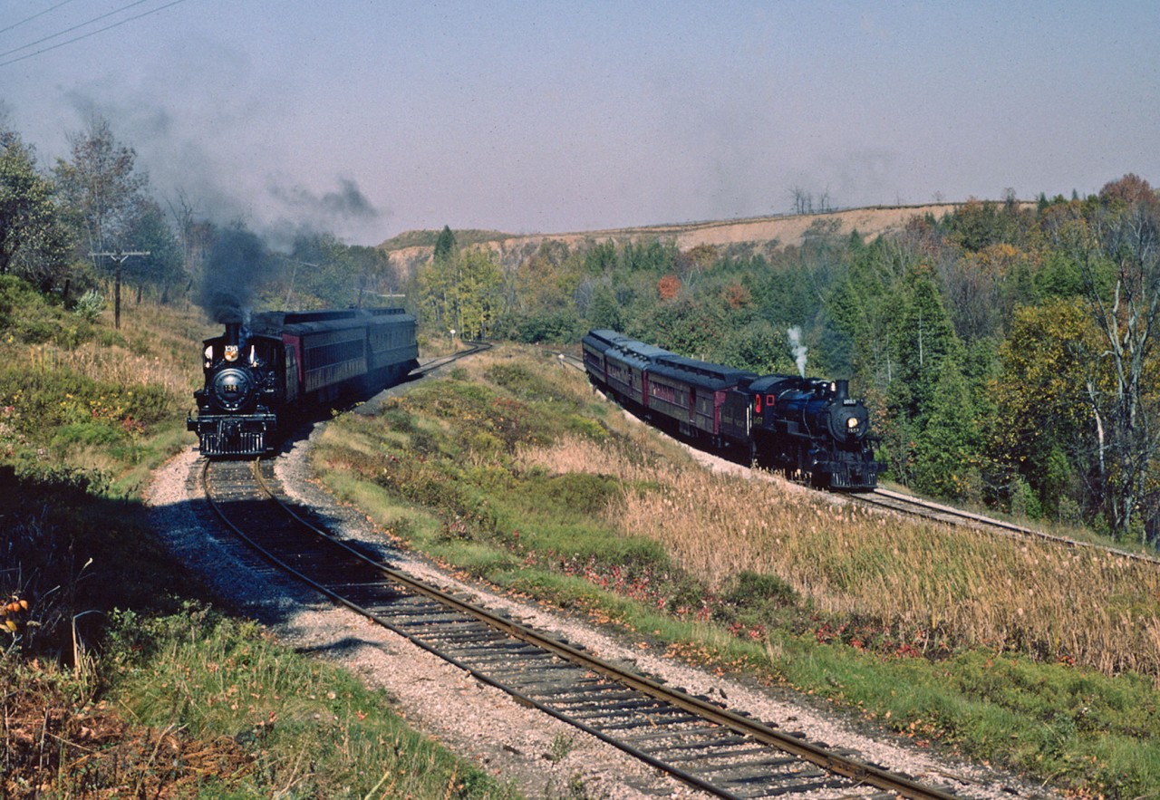 The weather could not have been better as the southbound ORA excursion split the power and train to set up this photo shoot.  Ex CPR 136 sits on the Elora Sub while 1057 is on the Orangeville Sub, later to become the Owen Sound Spur.  The Elora Sub is now long gone and the Owen Sound Spur could be on borrowed time as Orangeville Council decides its fate. Indeed, those were the days !