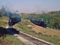 The weather could not have been better as the southbound ORA excursion split the power and train to set up this photo shoot.  Ex CPR 136 sits on the Elora Sub while 1057 is on the Orangeville Sub, later to become the Owen Sound Spur.  The Elora Sub is now long gone and the Owen Sound Spur could be on borrowed time as Orangeville Council decides its fate. Indeed, those were the days !