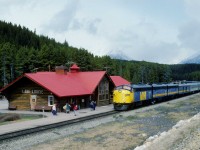 The Canadian arrived at Lake Louise station at 0955 on Saturday, May 17, 1986.  VIA FP9Au 6314 leads two ex CN F9Bs 6616 and 6617.    VIA extended the life of fifteen similar ex-CN units before purchasing its first F40PH-2 in 1986.   CN remanufactured former CN FP9 6527 at its Moncton Shops in New Brunswick in 1985. <br> <br>The former station is now the Station Restaurant that includes the heavyweight dining car "Delamere."  The last Canadian passed here in January 1990 due to massive government cuts to the VIA network.  The eastbound is at Mileage 116.6 of CP Rail's Laggan Subdivision on the original CPR alignment, as seen from the more recent lower grade line.