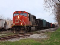 CN 439 prepares to drop 21 cars in Chatham Yard on their way to Windsor via the CASO, only a couple of weeks before they switched over to the Chatham Sub. Most of the cars were BLE open top hoppers, I'm not sure what they were for but they were around Chatham from time to time during this period.