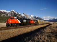 Brand new CN ET44AC 3276 returns east from Vancouver after making its maiden run west a couple of days ago. It's seen here at Henry House bringing Vancouver-Chicago train M356 to a stop to meet a couple of westbound trains. The new white roof on these units goes nicely with the white peaks of the mountains.