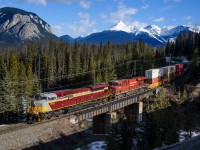 Wearing one of CP's heritage schemes, CP SD70ACU 7018 leads train 101-07 over the Ottertail River between Field and Ottertail on CP's Mountain Sub.