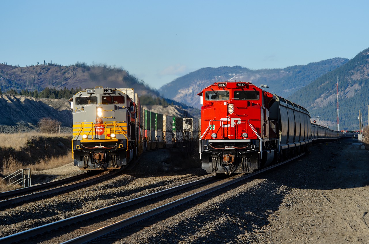 Wearing heritage paint, CP SD70ACU 7018 leads train 101-07 past brand new CP SD70ACU 7037 on the tailend of train 600-327 at the west end of the locomotive facility at Geddis on the Shuswap Sub. I'll say this, regardless of the paint scheme these new units wear, they look great!