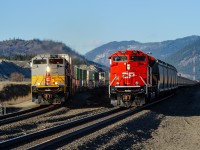 Wearing heritage paint, CP SD70ACU 7018 leads train 101-07 past brand new CP SD70ACU 7037 on the tailend of train 600-327 at the west end of the locomotive facility at Geddis on the Shuswap Sub. I'll say this, regardless of the paint scheme these new units wear, they look great!