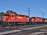 <br>
<br>
  After the DAILY VIA departure CP Rail #407 with 5593  /  5551 /  B & O (Chessie) 3716  prepares to follow # 1
<br>
<br>
 At CP Rail Thunder Bay June 19, 1985 Kodachrome by S.Danko. 
<br>
<br>
<a href="http://www.railpictures.ca/?attachment_id= 9145">   VIA #1 at Thunder Bay station   </a>
<br>
<br>
 What's interesting: 
<br>
<br>
  SD40-2 's ruled on CP Rail
<br>
<br>
 CP Rail owned 80 SD40 and 489+ SD40-2
<br>
<br>
 CP Rail #5551 class DRF-30b2 built 1967 as a SD40, then upgraded to SD40-2 electrical specifications
<br>
<br>
 B & O  ( Chessie *  ) #3716 is an EMD GP40
<br>
<br>
   [  *  The Chessie System paint scheme officially lived only 14 years: unveiled September 1972 and  ending July 1, 1986  when  the   C  &  O    merged into CSX Transportation    ( B  &  O merged into C & O April 1986 )  ]
<br>
<br>
 sdfourty
