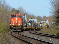 Getting across Ontario making decent time, 5626 is solo in charge of 72 cars of loaded windmill blades from Quebec on route to interchange in the Chicago land area. No slow orders between Mac Yard and Paris for this train making it a fast run until his first meet with G846 just after the slow order at Paris Junction (all trains do not exceed 30 mph is what I heard on the day of). After that meet occurred, these loaded blades were doing nothing but crawling until 434 bypassed him on the south track near the hotbox detector at mile 40. Finally, after cruising at a speed rate of 20 minutes for every 5 miles, X319 is working up to the mile a minute speed as it flies over the CP St Thomas Sub just west of Woodstock VIA at Carew.