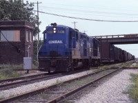  Conrail St Thomas to Windsor local WQST-1 "The Plug" passes beneath the Hwy 401 bridge and clatters across the C&O diamonds at Pelton on the South side of Windsor. 