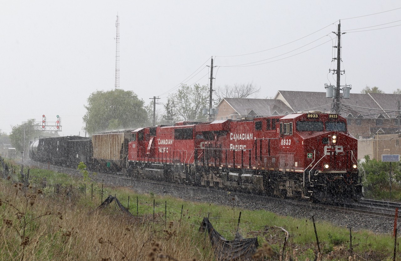 Yep, it was one of those days when timing truly sucked, LOL. With word that CP SD60M 6259 was on train 246 yesterday, I figured I'd try my luck today hoping it might lead 247 coming back. As the heavens opened up I knew my 50/50 chance, definitely didn't have luck on my side. There is something nevertheless about photography in the pouring rain, certainly more dramatic. We all have these days, and you just have to make the most of it :)