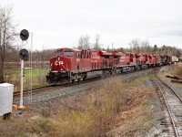 CP 420 has just finished lifting 5 cars from the BCRY interchange at Utopia, and is preparing to proceed south now the Conductor is back aboard. Five units on the head-end today, 9377 8793 9365 3055 and 8717. On the tail-end was a GO bi-level from Thunder Bay.