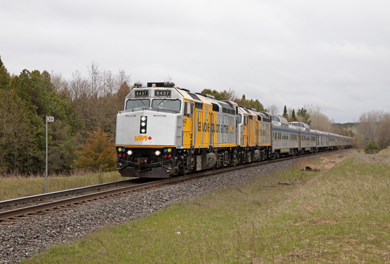 Once VIA Rail announced suspension of the Canadian and Ocean until November 2020, some interesting equipment moves started happening.  Evidently to place HEP cars in locations for overhaul, some have been moved to Toronto, while others are being moved west.  Mothers Day was when the first westbound equipment move took place.  Identified as VIA 11, two 6400's power the 10 car mixed consist past MP 39 of the Bala Sub, just north of Pine Orchard.