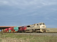 CP 119-01 pulls out of Vaughan Intermodal Terminal ready to go north with CP military unit 7021 on point. CP 8008 trails and CP 9832 is in the middle of the train. 