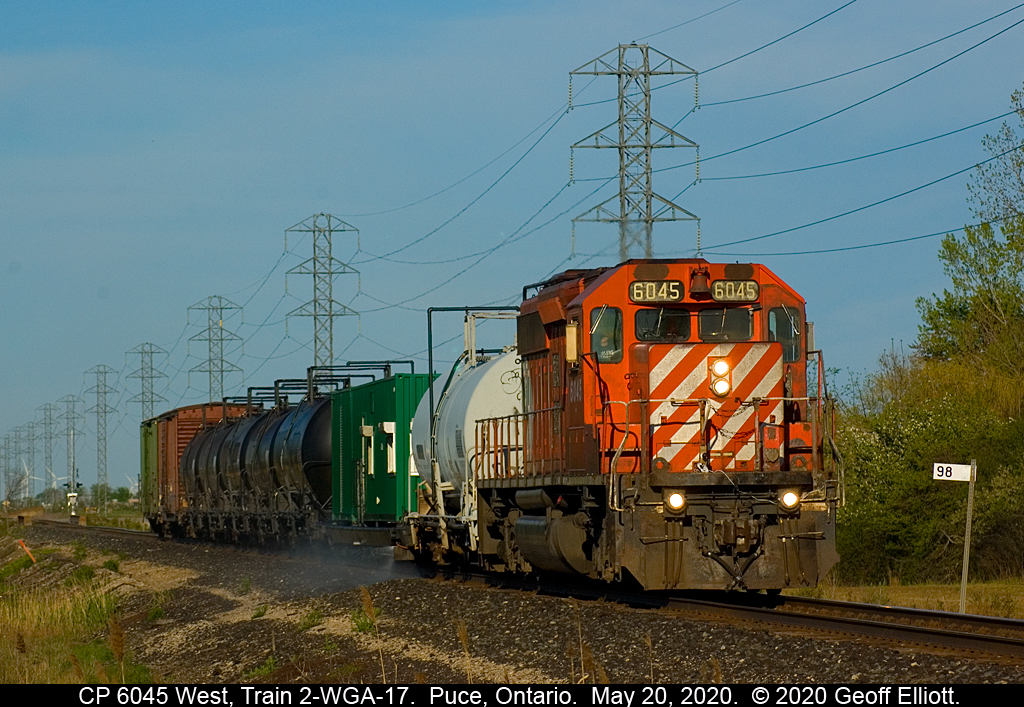 CP 6045 West, train 2-WGA-17, passes MP 98 of the CP Windsor Subdivision in Puce, Ontario on May 20, 2020 as it sprays the weeds along the RoW to keep it nice a clean for any possible post-Covid railfanning in 2020.