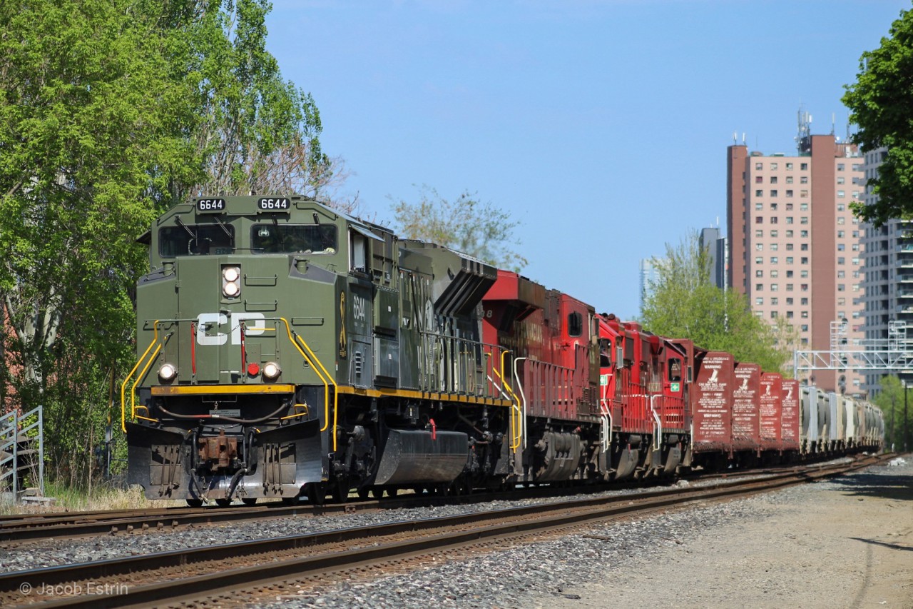 Here we have CP 421, a Toronto to Winnipeg Manifest passing through Osler with CP 6644 Leading a four unit Lashup. The Lashup included 6644/8938/3134/3119.