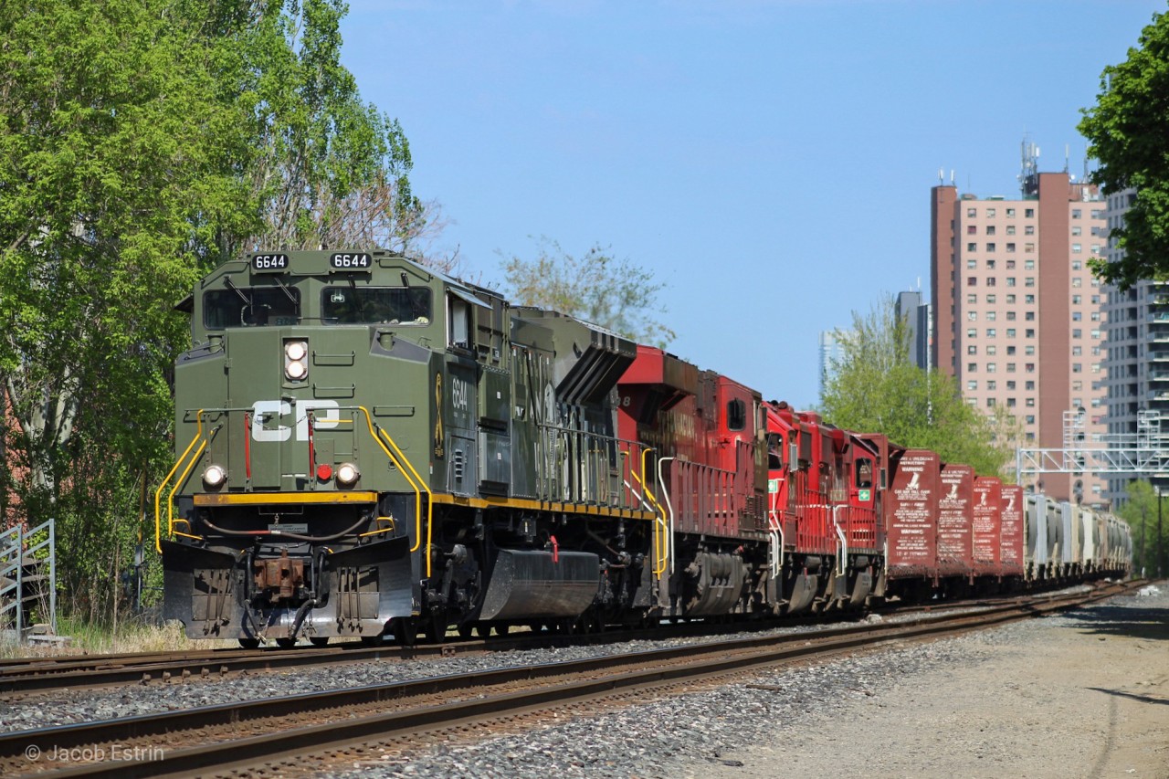 Here we have CP 421, a Toronto to Winnipeg Manifest passing through Osler with CP 6644 Leading a four unit Lashup. The Lashup included 6644/8938/3134/3119.