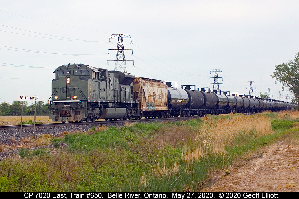 Seems like every time CP 7020 goes through Belle River it's a cloudy grey day.  Today is no exception as Train #650 comes to the east 'Belle River' mileboard with 7020 leading the way.  Hopefully the guys further east will have better luck with the sun.