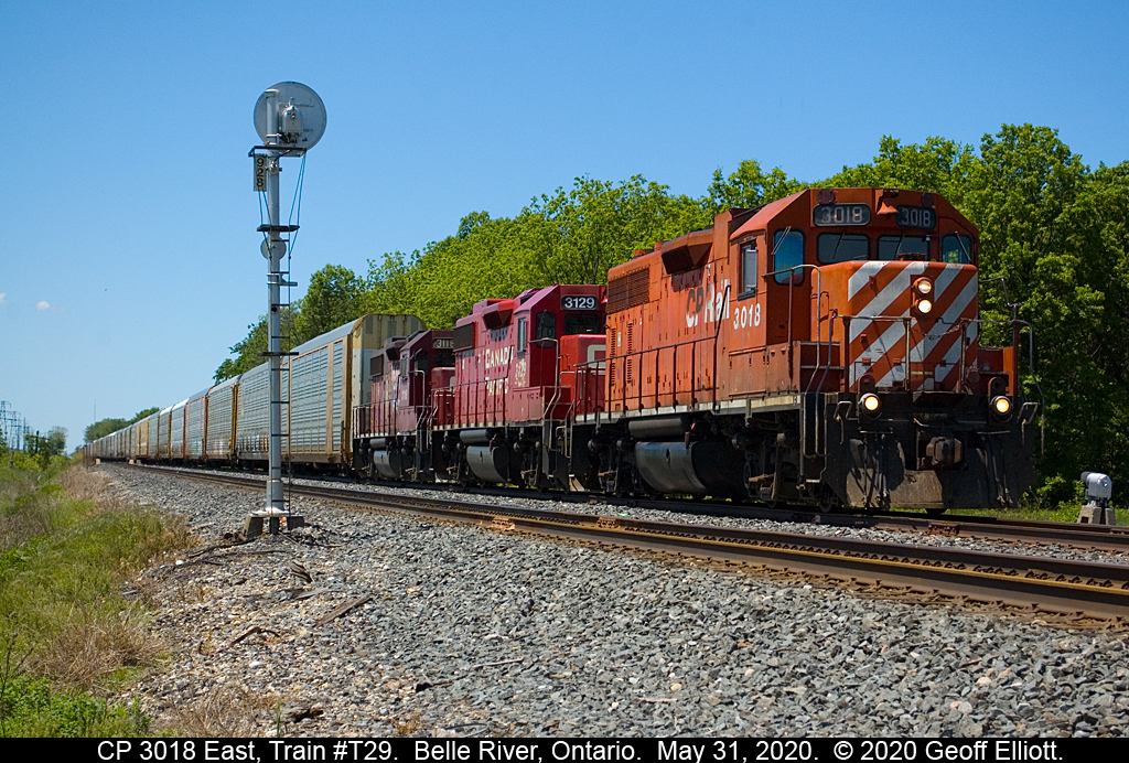 A nice set of 38's will usually get me out to take a look.  But those are usually in pairs...   ;-)   Since I didn't see any of those around I instead ventured out to shoot this trio of CP GP38's on today's T29, or as I referred to it today, the "COVID Turn".  Here the trio is lifting around 90 empty racks that have been stored in Belle River, Ontario since the COVID-19 lockdown began.  Nice to see some of the old power still working hard and making miles.