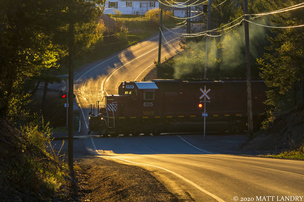 NBSR 6315 leads an early morning New Brunswick Southern Railway westbound at Welsford, New Brunswick.