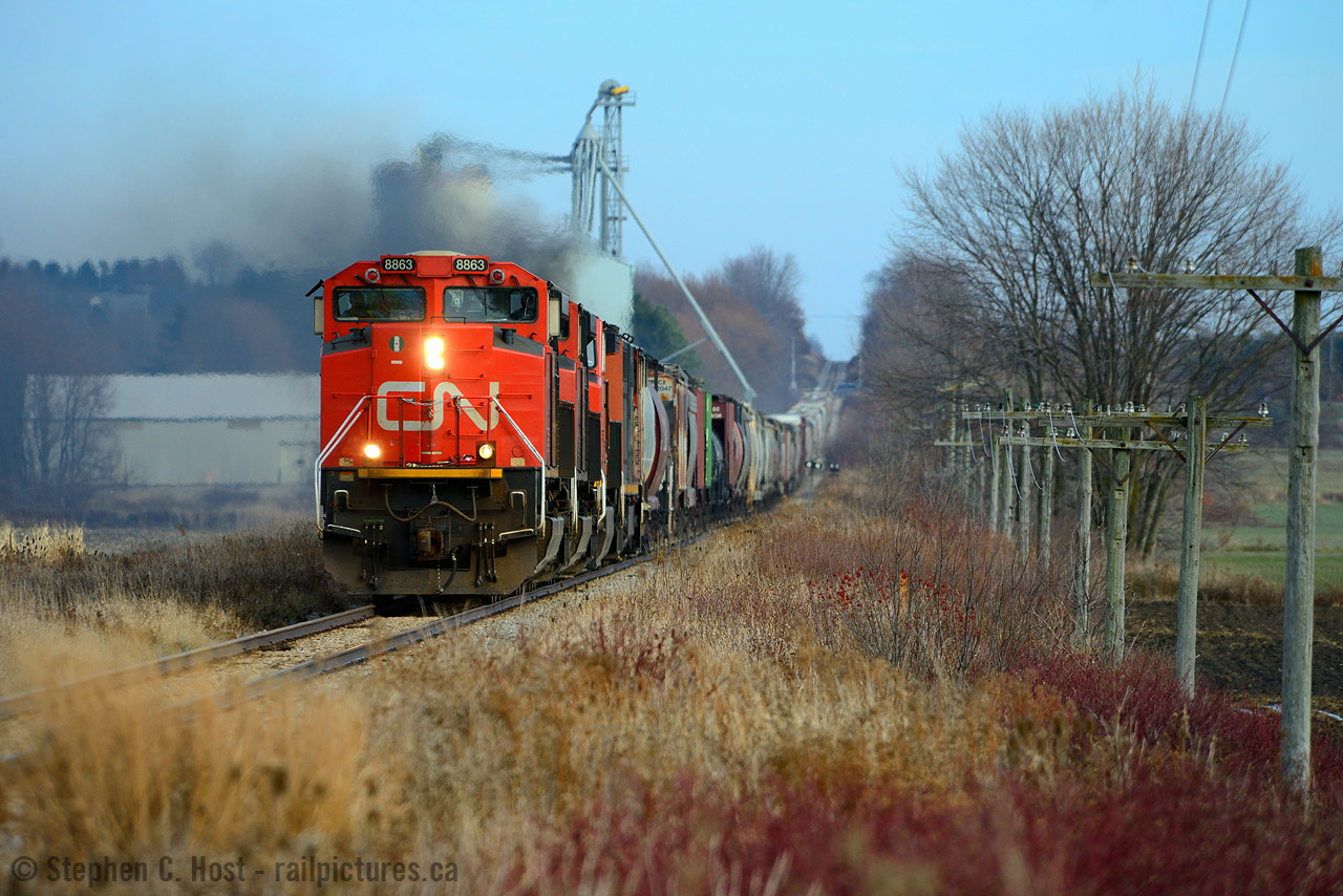 While GEXR may be gone from here, echoes of the GEXR continue to reverberate. During the CN strike of 2019 the crews out of Kitchener were unaffected because they are under a different Union agreement, still called by their former name the GEXR. Big power was left stranded by the Toronto (Non GEXR) crews in Kitchener due to the strike and the former GEXR crews were happy to use it for a few days while their brothers in the Union ironed things out. At shakespeare, the mill in the background is shrouded in EMD 16-710 exhaust as 8863 works hard to maintain track speed on the hilly Guelph subdivision. SD70M-2 8863 was built only 30 miles away at EMD's London facility in late 2008 and a second identical unit was right behind it on this train making it sound very nice. More to come from this fantastic day.