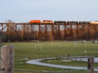 The now abolished Cayuga Clipper operated by OSR is seen pulling over the Athletic Park trussle in St Thomas with the last minutes of sunlight casting onto the bright red CP multimark paint on 8235 about to drop their cut of cars in the CN St Thomas interchange Yard from Courtland Agromart, Future Transfer, and IGPC all from the now abandon Cayuga Spur. Unfortunately, only seeing 1 daily operated CN local from London (called off sometimes) and a 3 day a week OSR move that sometimes will pass over this bridge for headroom if they even interchange with CN, this bridge had definitely seen more frequent and active movements in its time prior to 2020. That search button at the top of the page can back that statement up with 100% accuracy. 