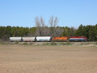 After dropping off a single hopper in Hensall, 581 has returned to the Goderich Sub and is seen heading back to Stratford.