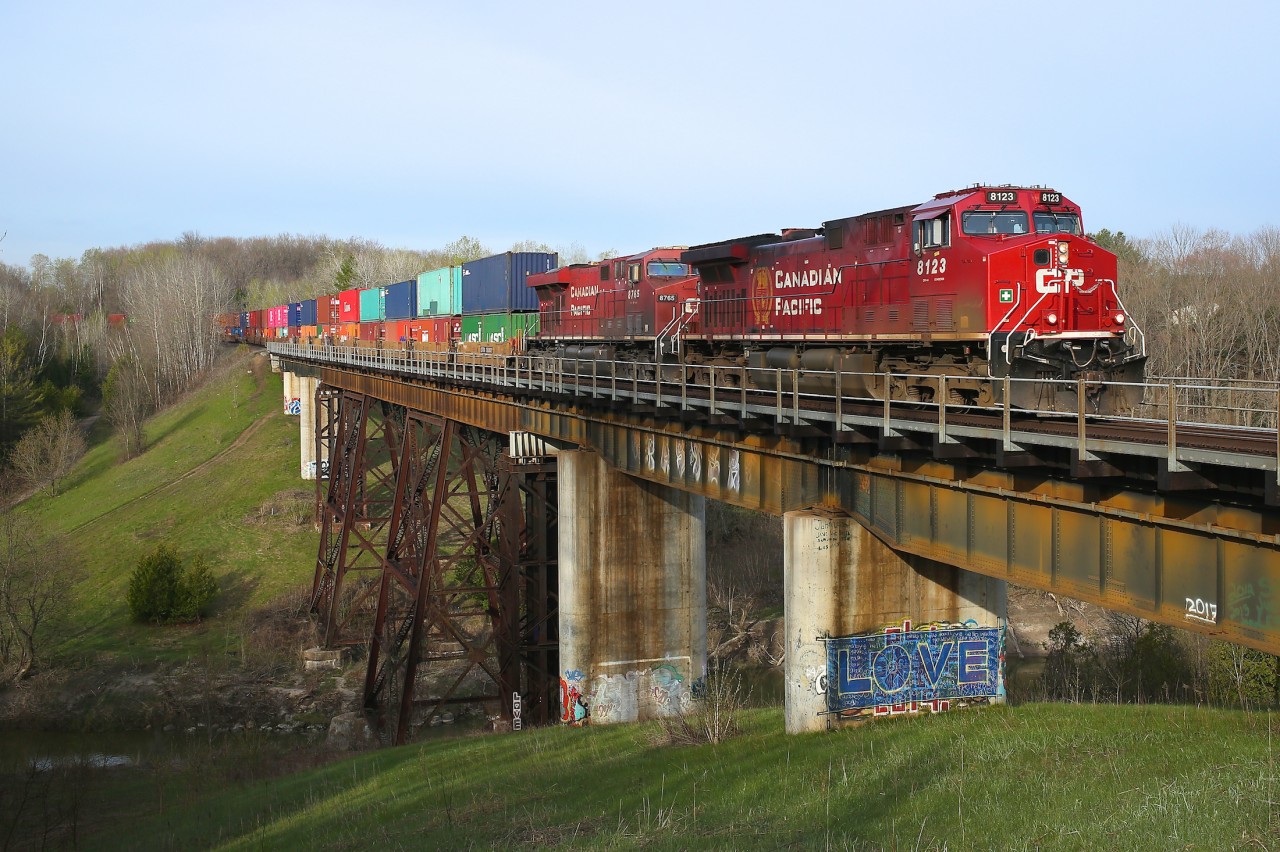 CP 119 makes its way across the Baxter bridge with clearance to Mactier.