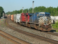 CP 234 with CEFX 1054 and 8037 break the early morning silence as they depart Guelph Jct. on the Galt Subdivision at 08:15 after setting-off 24 cars for Ontario Southland, which operates the Guelph Junction Railway (GJR).