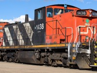 I took advantage of no auto traffic, great sun and close approach to catch a roster shot of the 1438. It was nice finding it out at the CN-CP exchange yard, located by Suncor. The last several times, I have only seen it working the yard at Clover Bar. I have my fingers crossed that at some point it will be freed of the middle unit position.