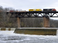 Q14891 01 rolls across the Grand with CN 3845, EMDX 7201, and 89 cars