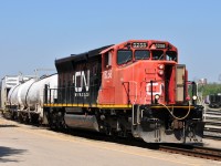 CN 5258 leads their 7 car weed spraying consist through Brantford on a blistering hot May morning

